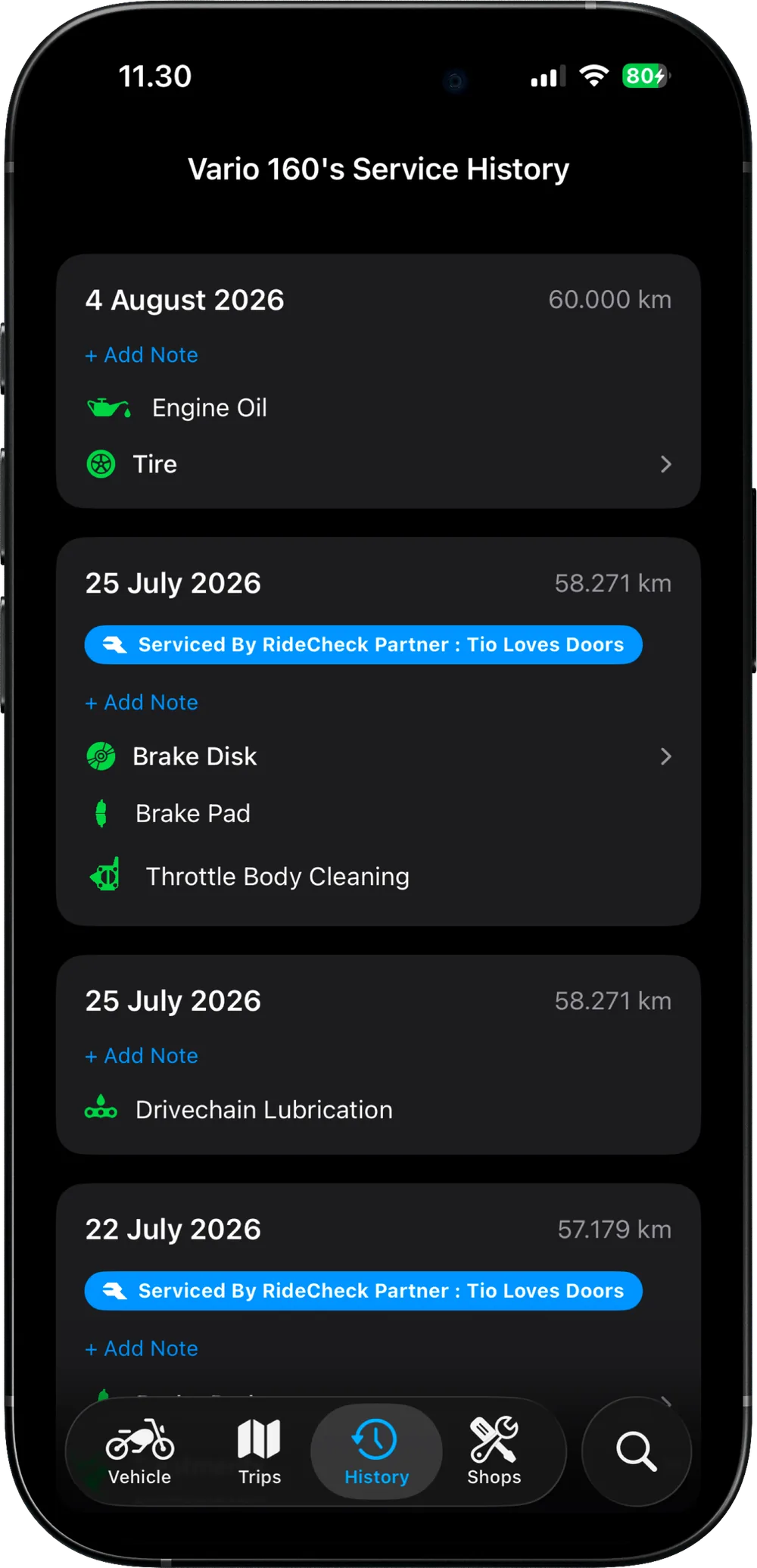 A RideCheck service history, each entry carrying its date, the odometer reading, the components replaced, and the partner workshop that did the work